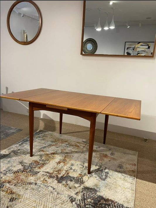 Parker dining table, model 140, mid century dining table for sale. Parker furniture in Sydney. Full restoration by Covesmore Solutions.