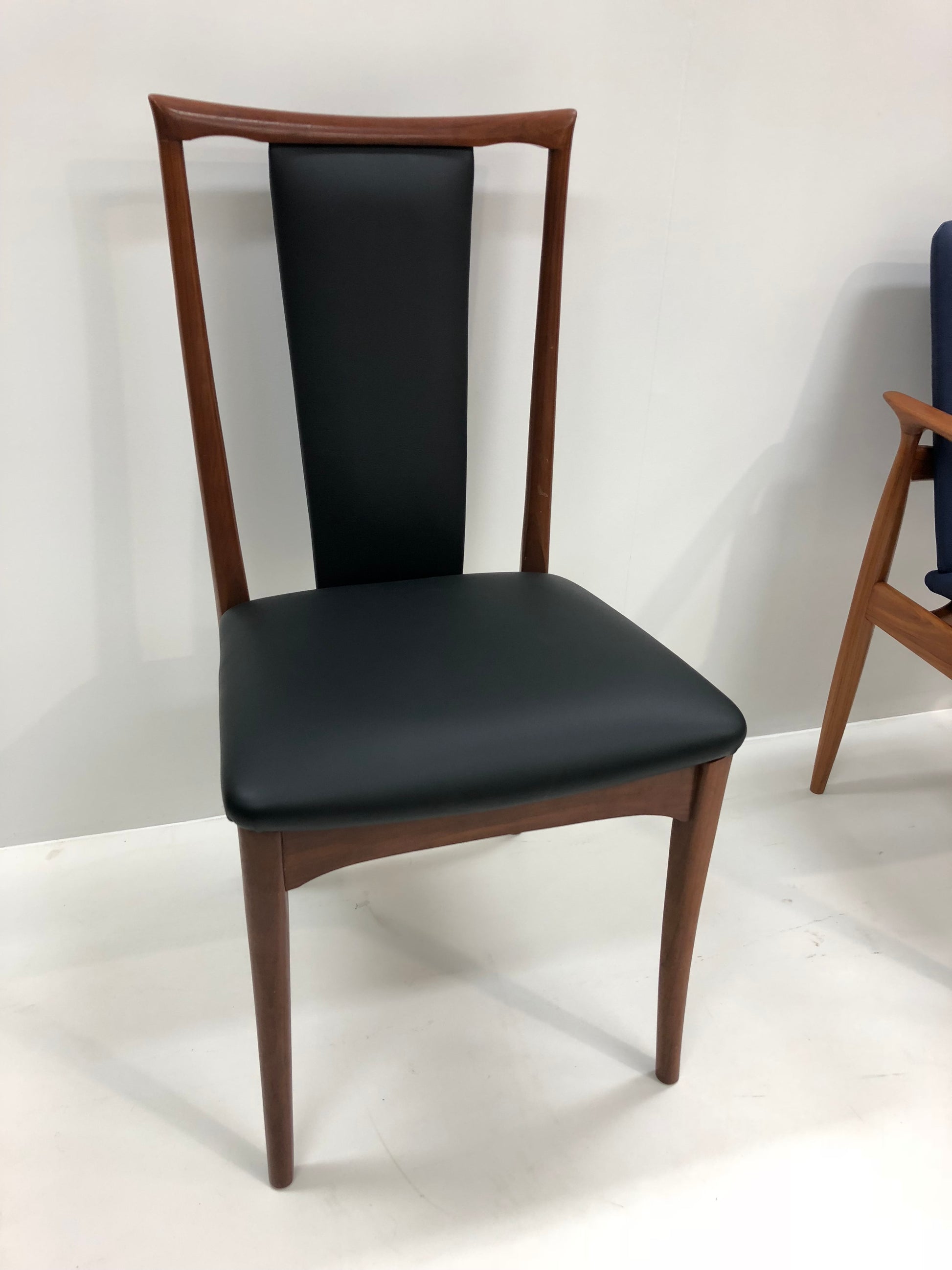 Parker Furniture Dining Chair, Model 60. Reupholstered in Black Leather. Available online for purchase.