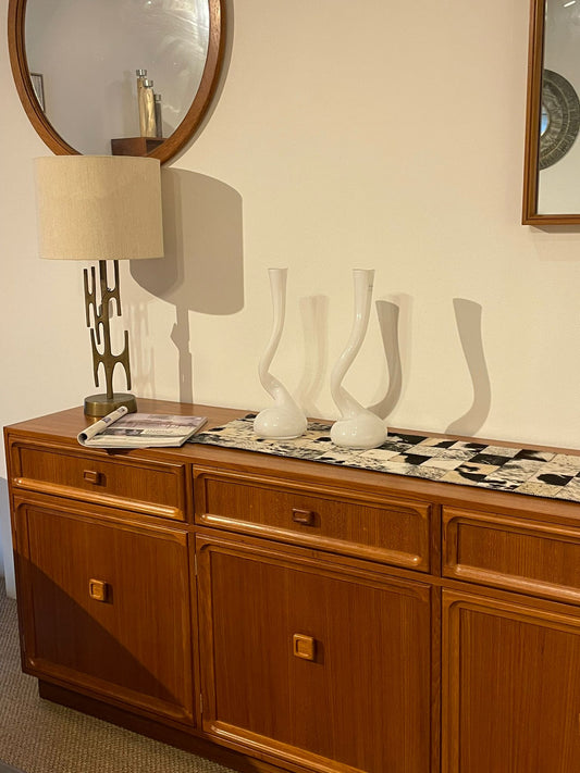Parker Furniture Wooden sideboard, Teak Series 20, with decorative items against a wall with mirrors in Willoughby, Sydney. This parker furniture is for Sale.