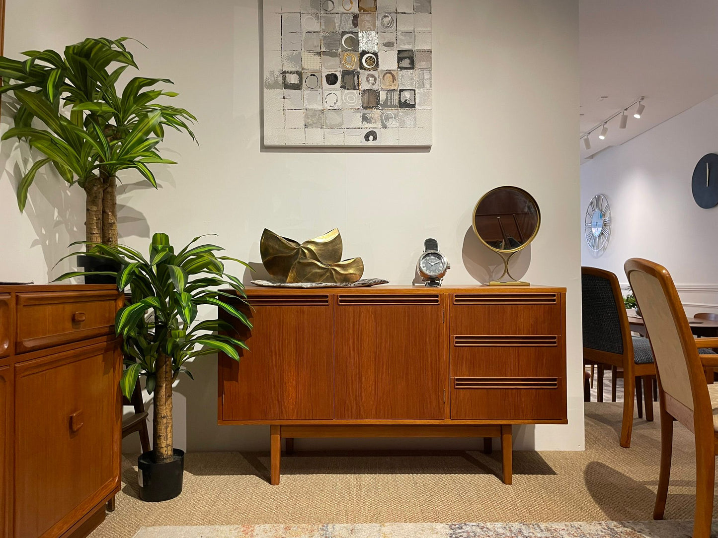 Wrightbilt Wooden sideboard with decorative items in a room setting. Available in Sydney, Willoughby by Covesmore solutions.
