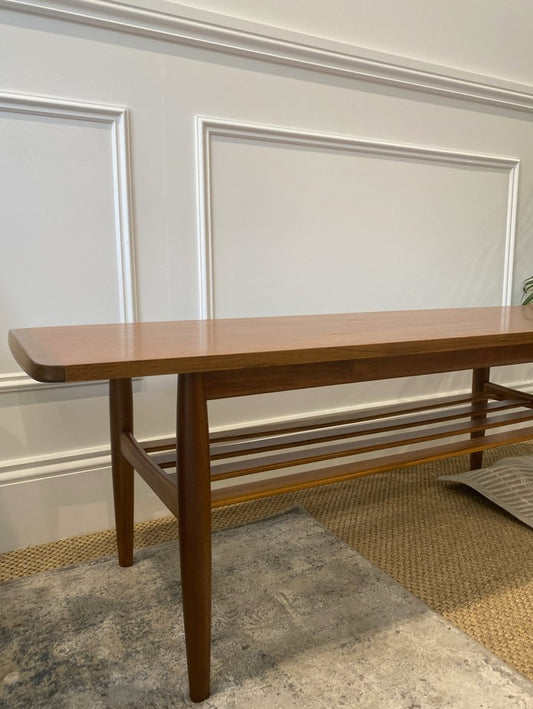 Elegant Parker Furniture Model 126 coffee table professionally refinished in warm teak.