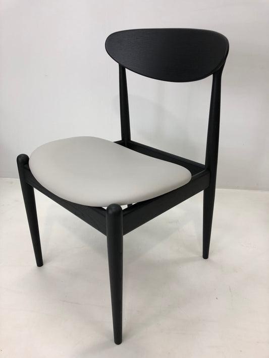 A Tony Parker Charcoal Black chair Model 107, unique in its appearance, timeless in its design. Available at Covesmore Solutions for Parker Furniture Sydney.