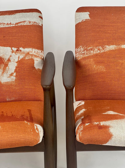 Parker 119 chair, Available online or in Willoughby at Parker furniture showroom. Chair features a beautiful orange designer fabric.