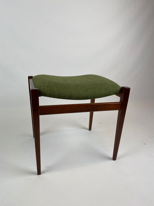A Parker stool with green cushion on a plain background. Restored by Covesmore Solutions, Available online or at Parker furniture showroom in Willoughby, NSW, 2068.