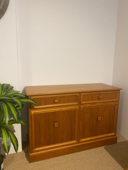 Elegant Parker Furniture Model 20 sideboard with drawers and cupboard storage.
