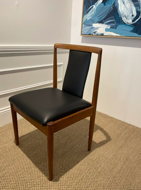 A Parker 88 chair, wood fully stripped and repolished, reupholstered in black leather. This Parker furniture is for sale.