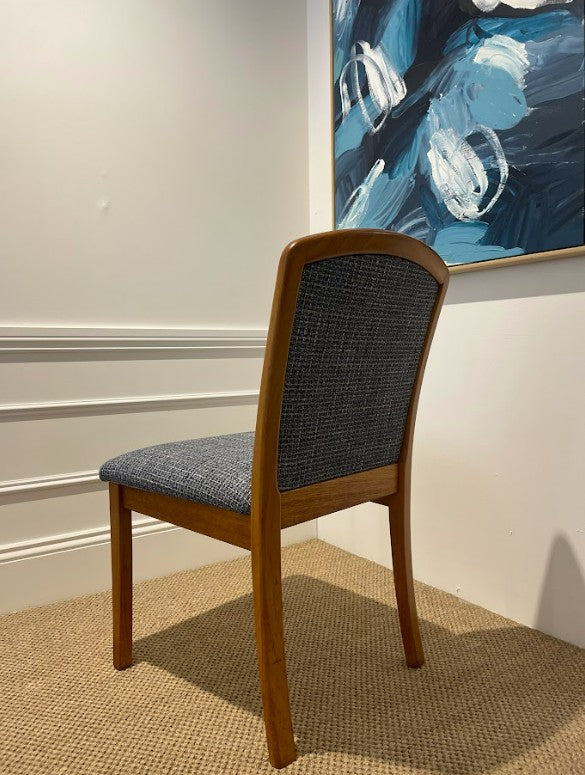 Wooden Parker chair, model 92,  with blue cushioned seat and backrest in a room with a painting on the wall. This Parker furniture is for sale. Available online or in Willoughby at Parker furniture showroom.