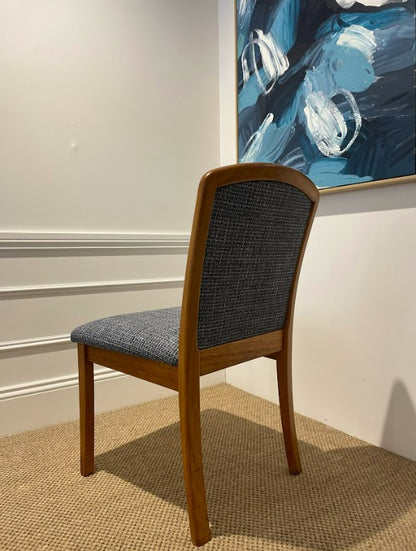 Wooden Parker chair, model 92,  with blue cushioned seat and backrest in a room with a painting on the wall. This Parker furniture is for sale. Available online or in Willoughby at Parker furniture showroom.