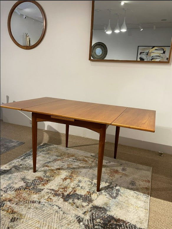 Parker dining table, model 140, mid century dining table for sale. Parker furniture in Sydney. Full restoration by Covesmore Solutions.