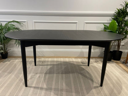 Parker dining table stained black, fully stripped and repolished by Covesmore Solutions. Available for purchase in Willoughby.