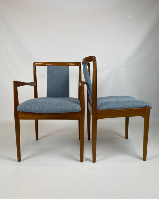 Pair of Parker chairs, Model 88 & 89, with blue upholstered seats on a white background. Parker Furniture restored by Covesmore. Available online or in Willoughby at Parker furniture showroom.