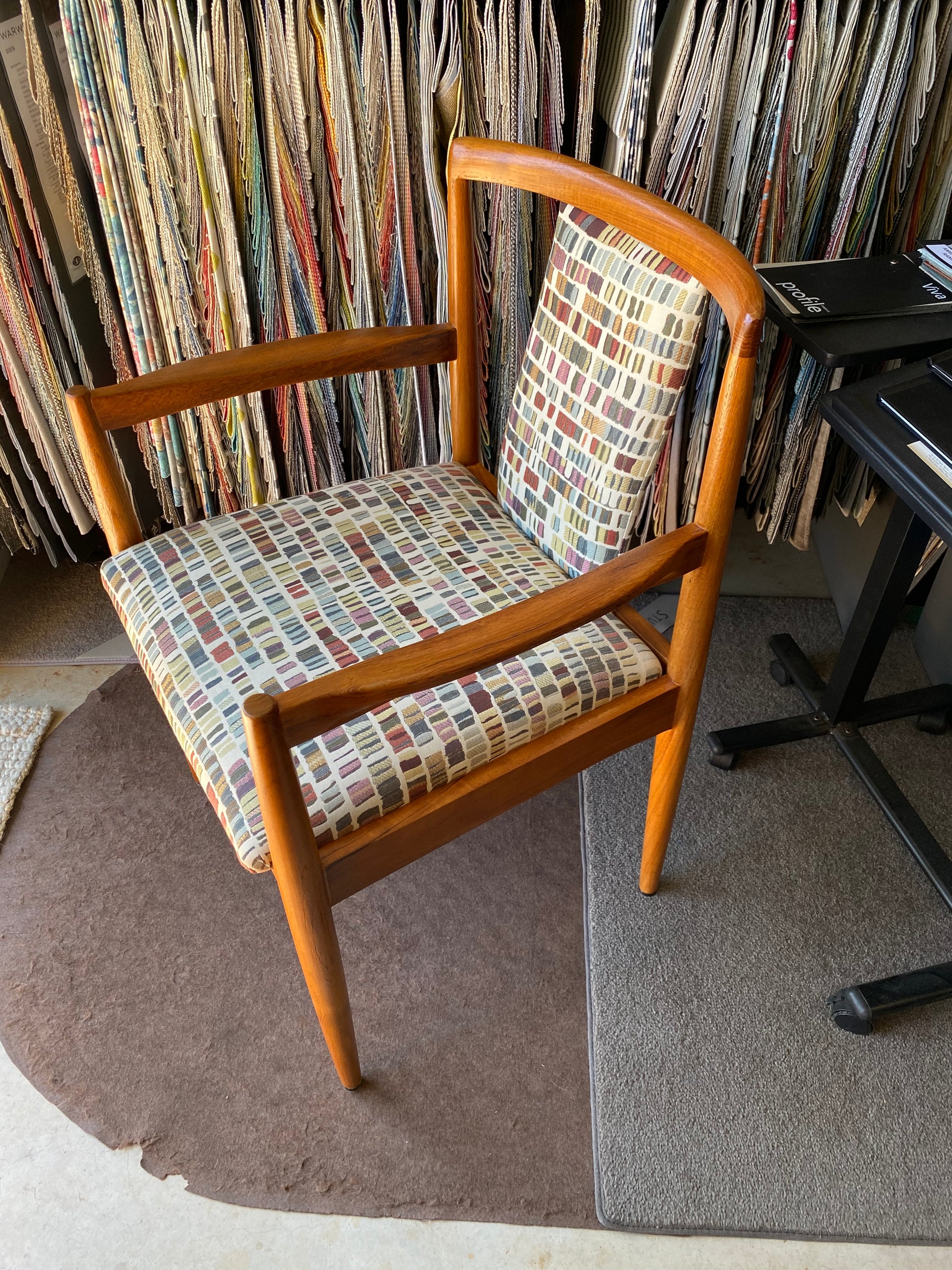 Side view of beautiful Parker 89 dining chair refurbished and available for purchase.