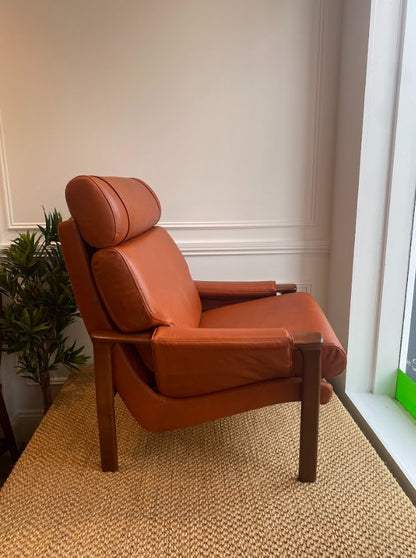 Tessa armchair, reupholstered in leather, available for purchase at covesmore solutions in Sydney.