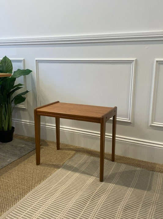 Mid century coffee table in a room with framed pictures on the wall and a plant. Available online or for viewing at Willoughby showroom. Ex Parker People™