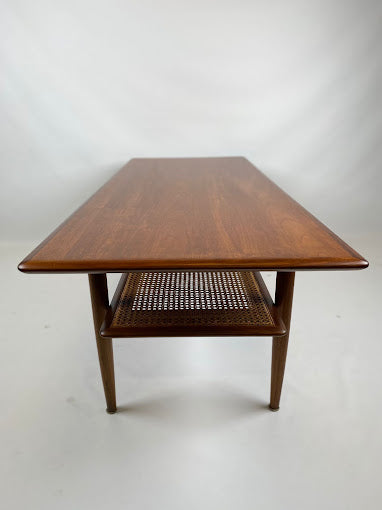 Close-up of Parker Model 138 coffee table – repolished teak and cane. Ex Parker People™