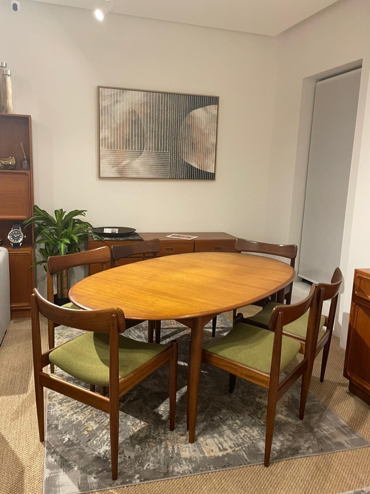 Parker furniture dining suite, featuring six parker 105 chairs and a Parker dining table, model 91. Full restoration by the Ex Parker People™ in Sydney.