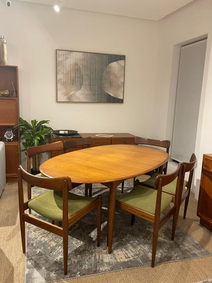 Parker furniture dining suite, featuring six parker 105 chairs and a Parker dining table, model 91. Full restoration by the Ex Parker People™ in Sydney.