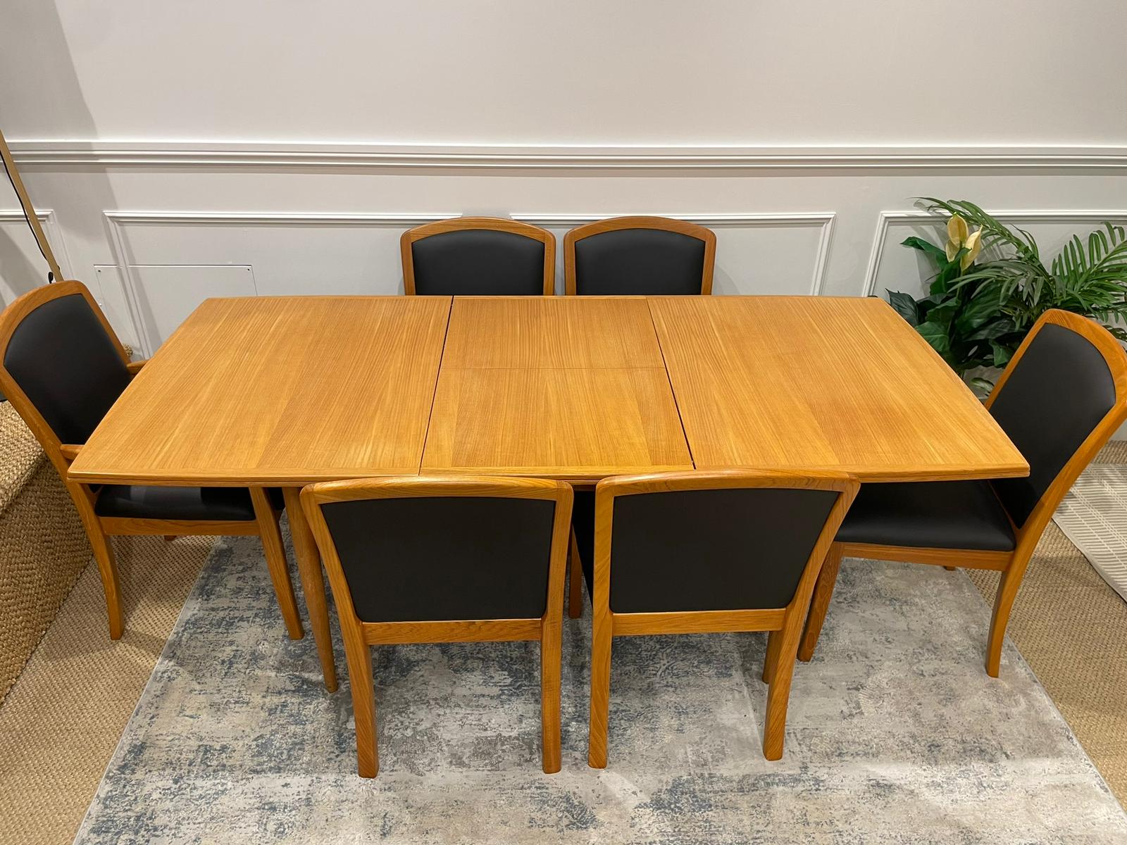 Parker dining table, model 83 and Parker chairs, model 92. The set is by Parker Furniture Australia. Fully Restored by Parker Specialist Covesmore Solutions and available for sale in Sydney.